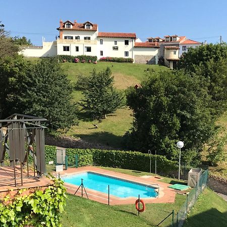 Апартаменты La Terraza Комильяс Экстерьер фото